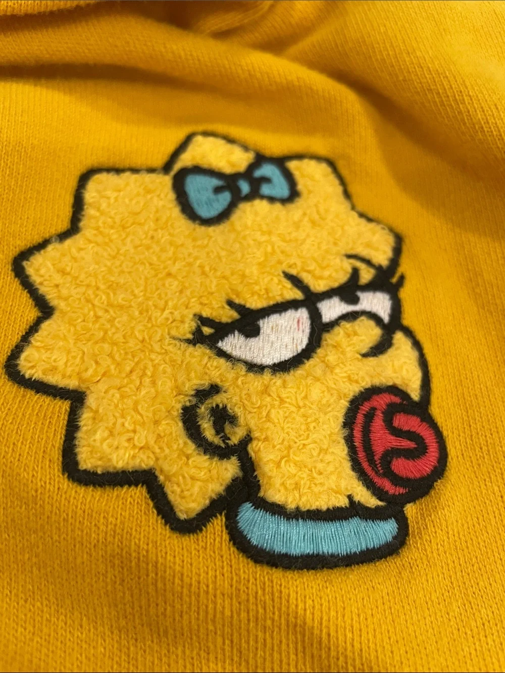 Kids' Yellow Hooded One-Piece with Maggie Simpson